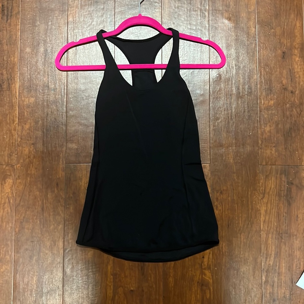 Lululemon black tank top! Practically brand new!! Maybe worn once!